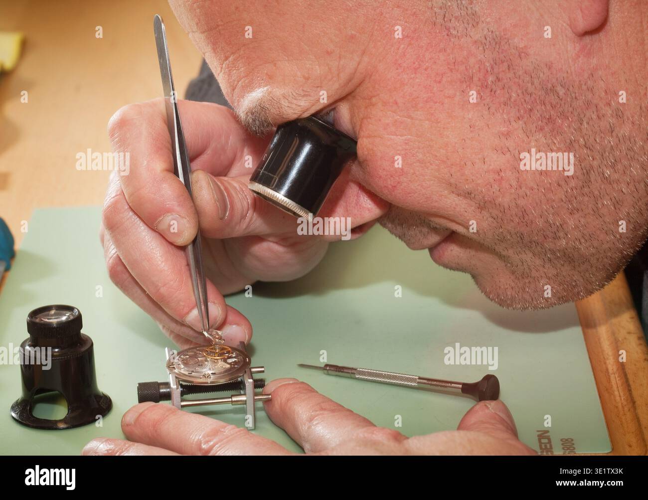 Watchmaker Using Microscope Mechanical precision hi-res stock photography and images - Alamy