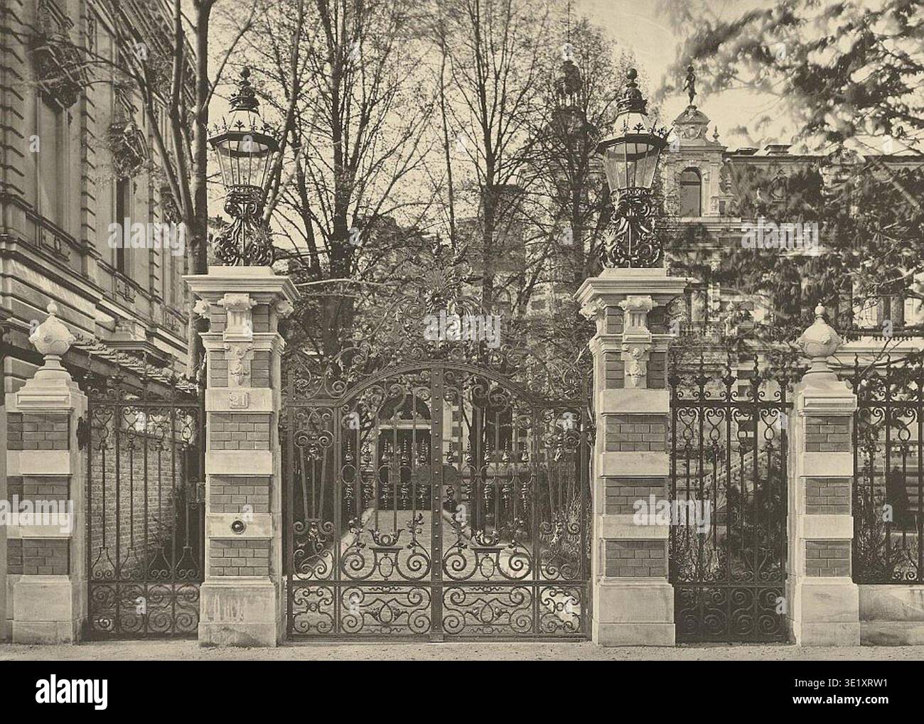 Palais Reichenheim was a palace residence constructed in nineteenth-century Berlin and designed by architects Kayser & von Großheim at Rauchstraße 21 in the Tiergarten district. The archival photographic record documents a historical photographic print issued by Römmmler & Jonas in 1882 showing the garden entrance portal and street gate with wrought-iron work executed by Ed. Puls. Stock Photo