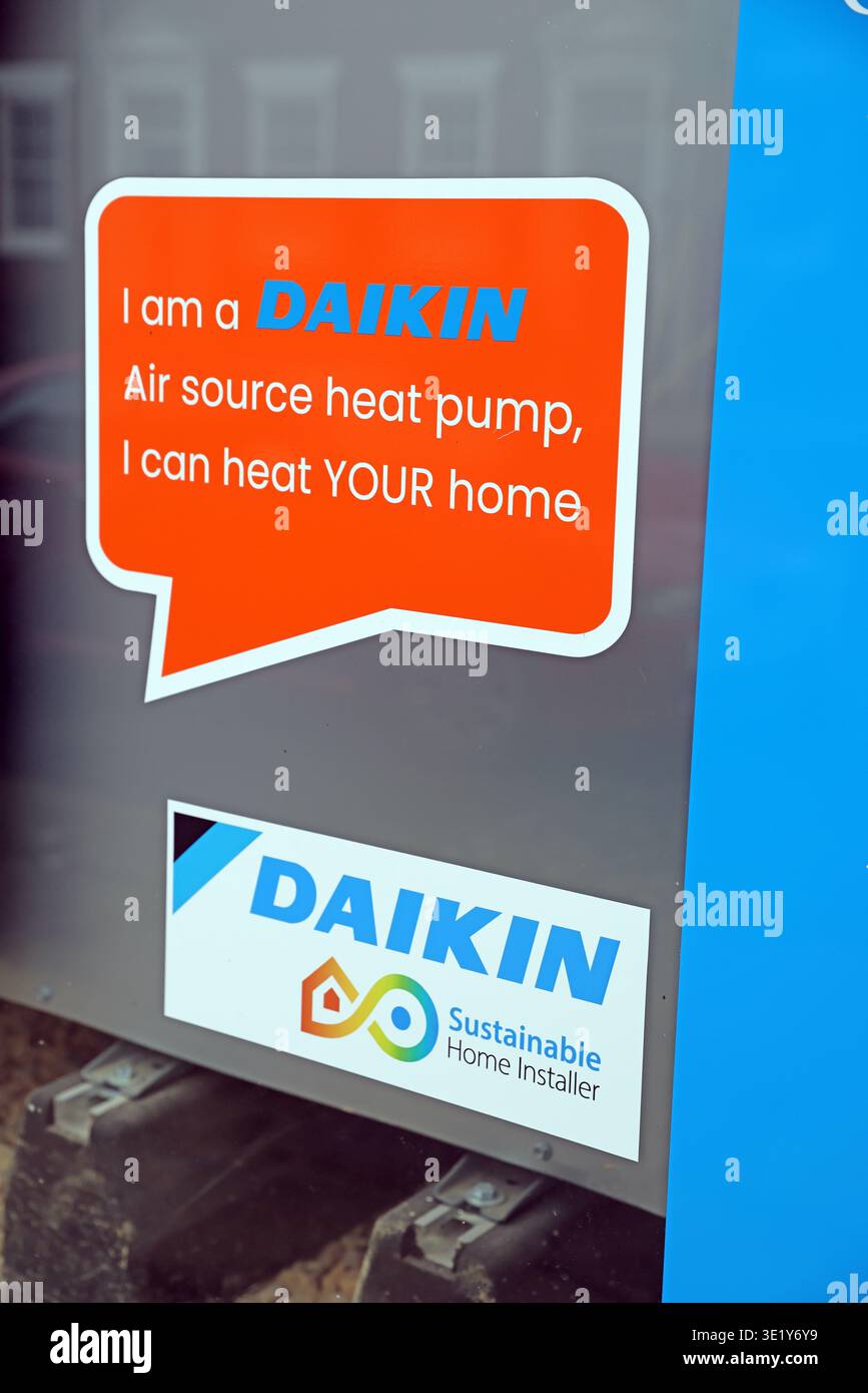 Daikin air source heat pump installer branding on outdoor unit in Beverley, East Yorkshire,highlighting low-carbon home heating and net-zero messaging Stock Photo