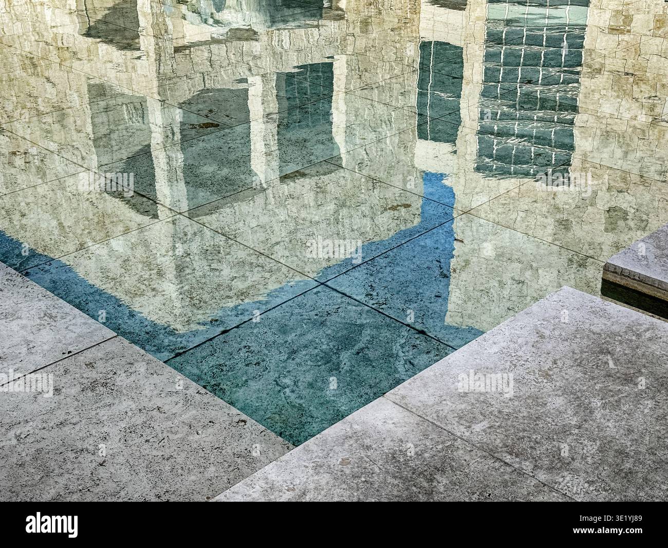 Abstract representation of several buildings with windows as reflected ...