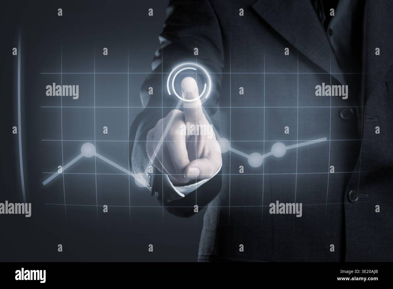 Businessman navigating data in chart on futuristic touchscreen display Stock Photo
