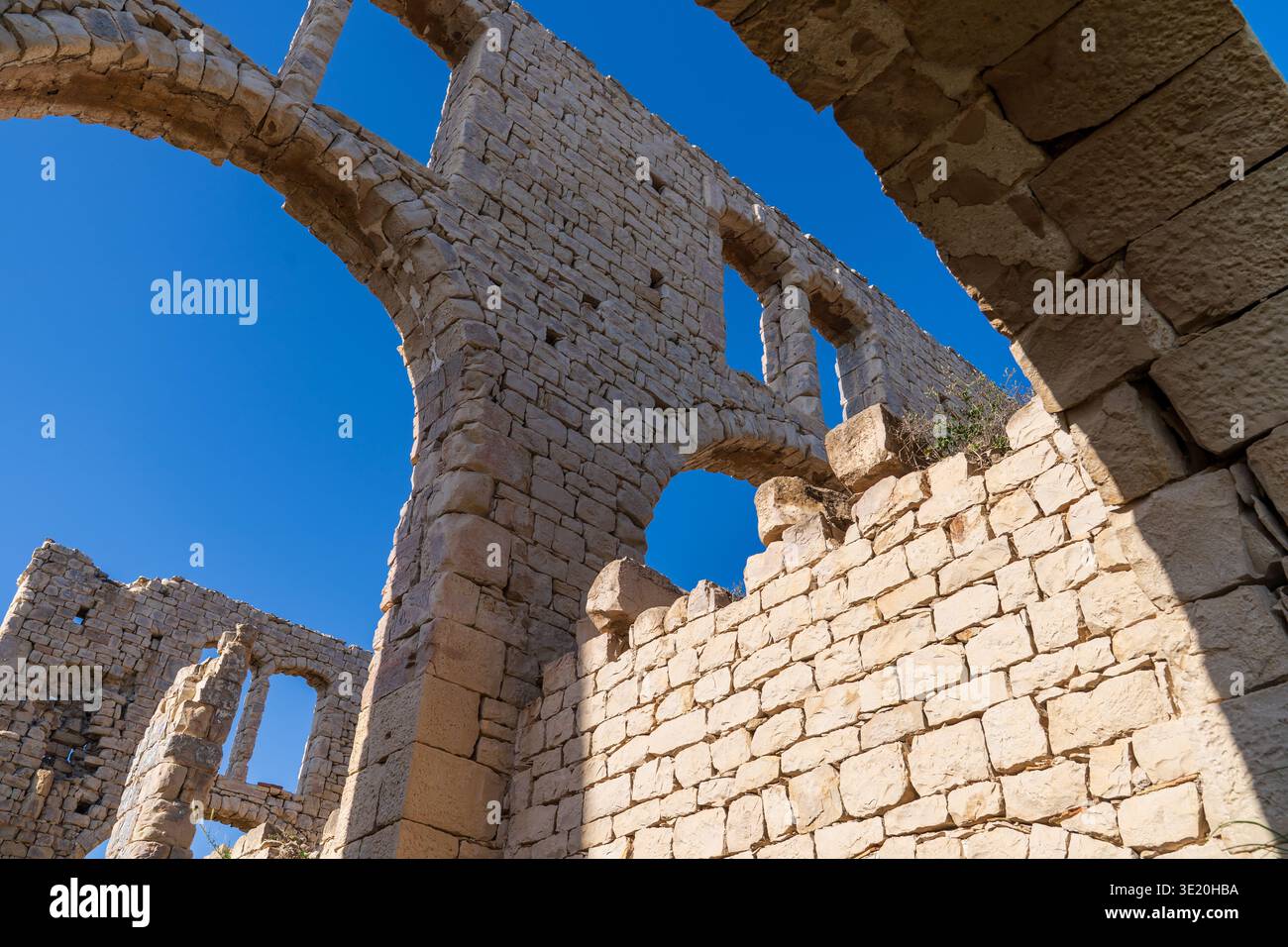 Low-angle perspective view inside the Fornace Penna ruins in Sampieri ...