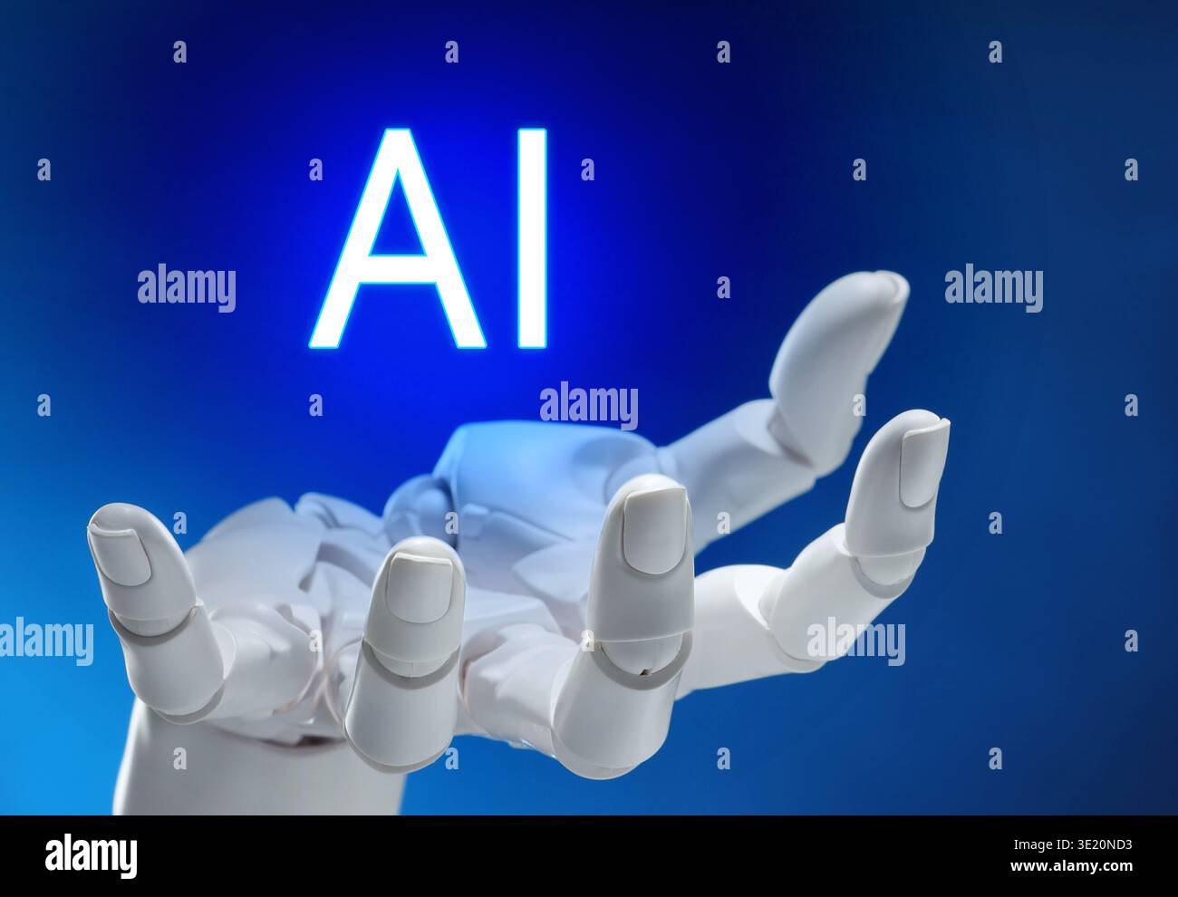 Robot hand holding virtual AI sign against blue gradient background. Artificial intelligence concept Stock Photo