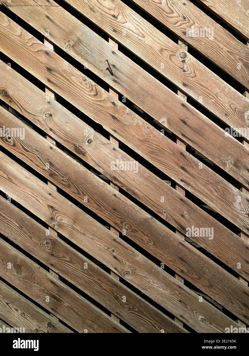 Diagonal Wooden Slats Background with Natural Wood Grain Texture - Smartphone Captured Stock Image