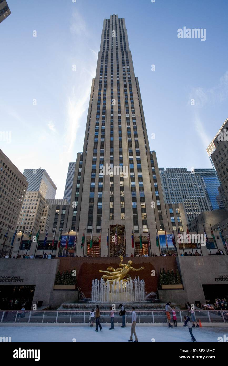 Skaters at the Rockefeller Center ice rink with the Prometheus statue ...