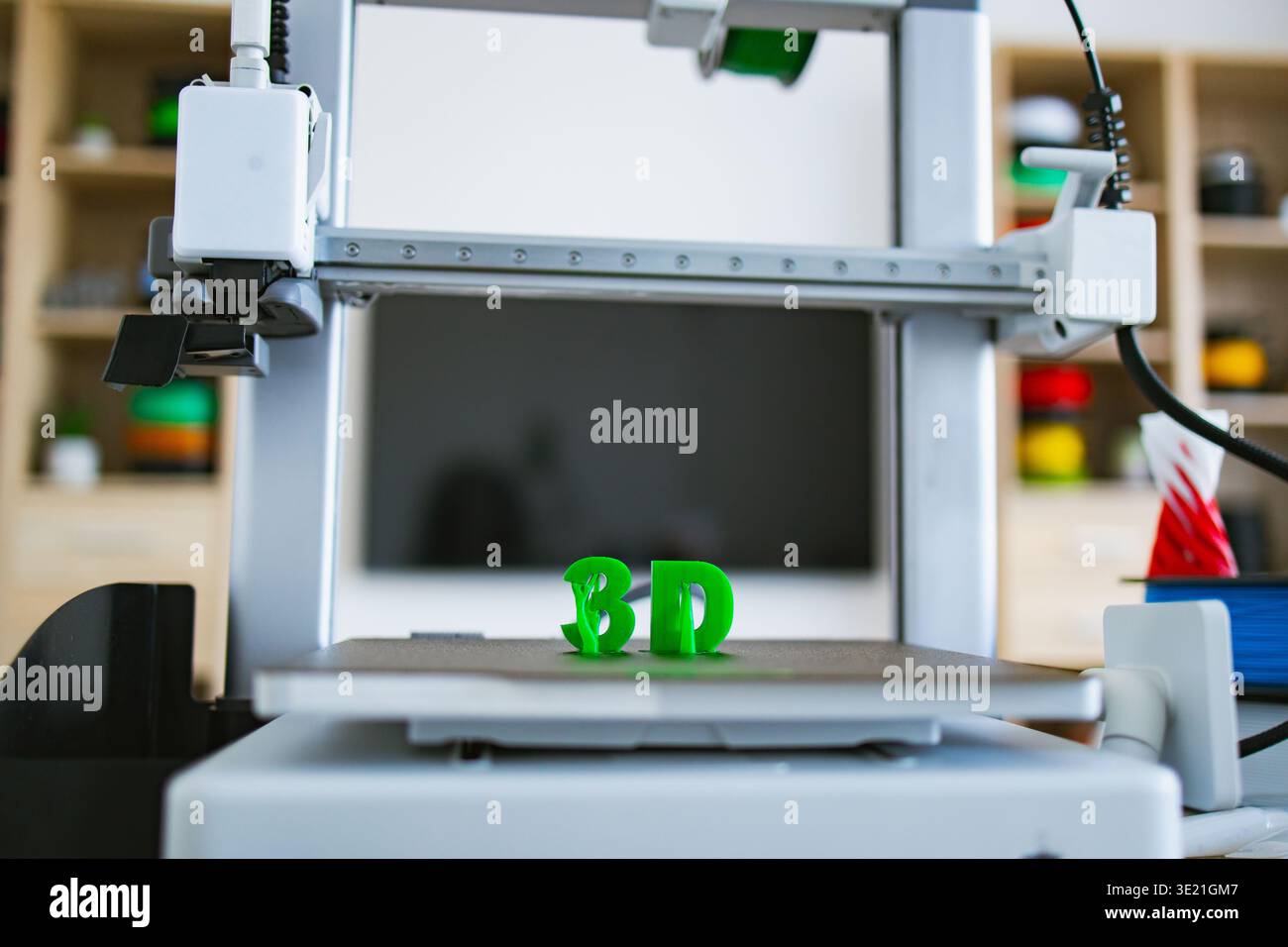 3D Printer Creating Letters Stock Photo