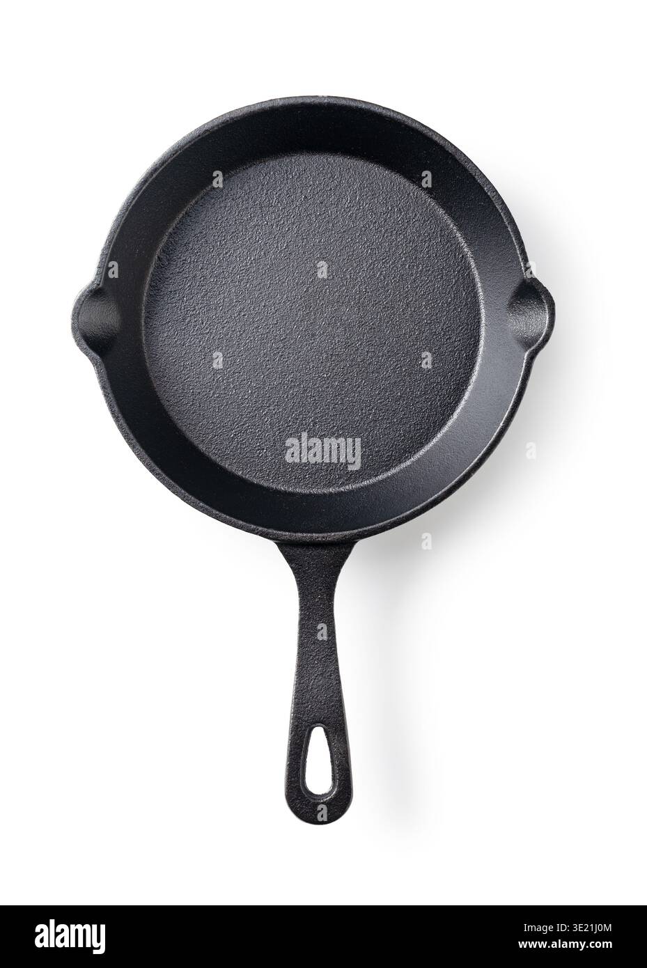 Empty cast iron skillet isolated on white background, top view Stock Photo