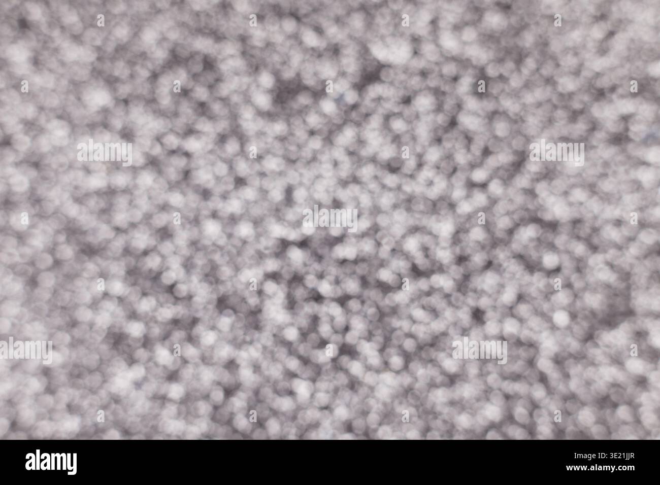 Abstract silver glittering background, holiday concept Stock Photo