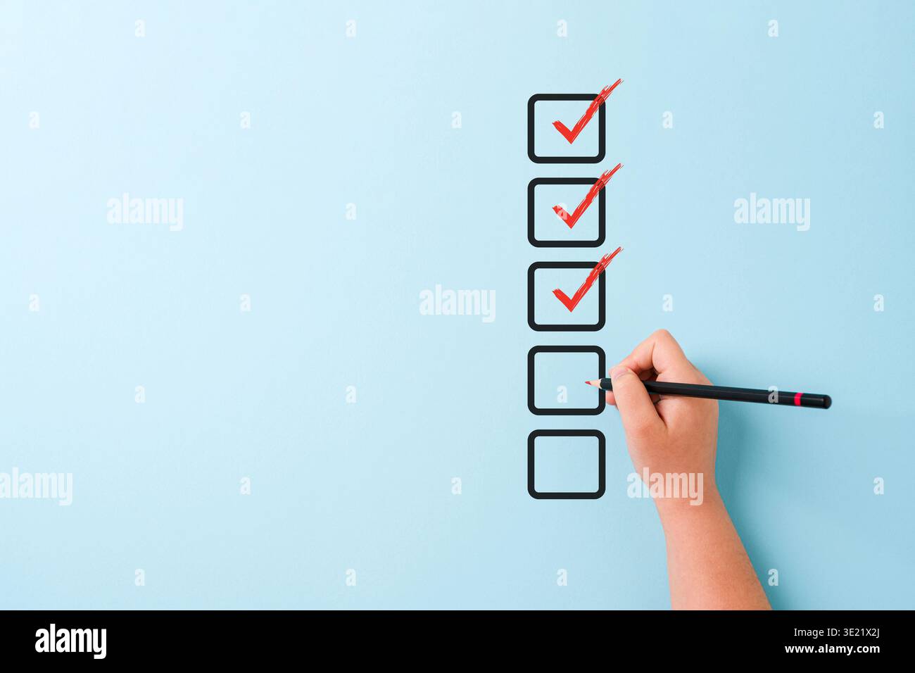 Hand checking checklist boxes representing task completion and productivity concept Stock Photo