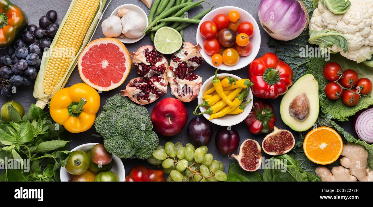 Assorted fresh ripe fruits and vegetables background Stock Photo