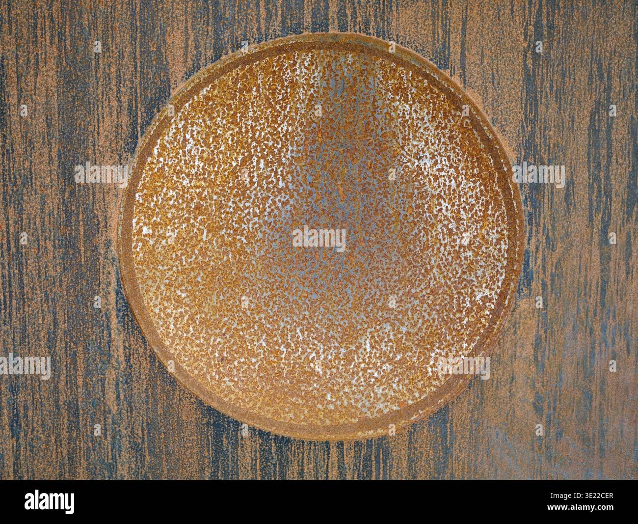 rusty metal plate with circular texture pattern Stock Photo
