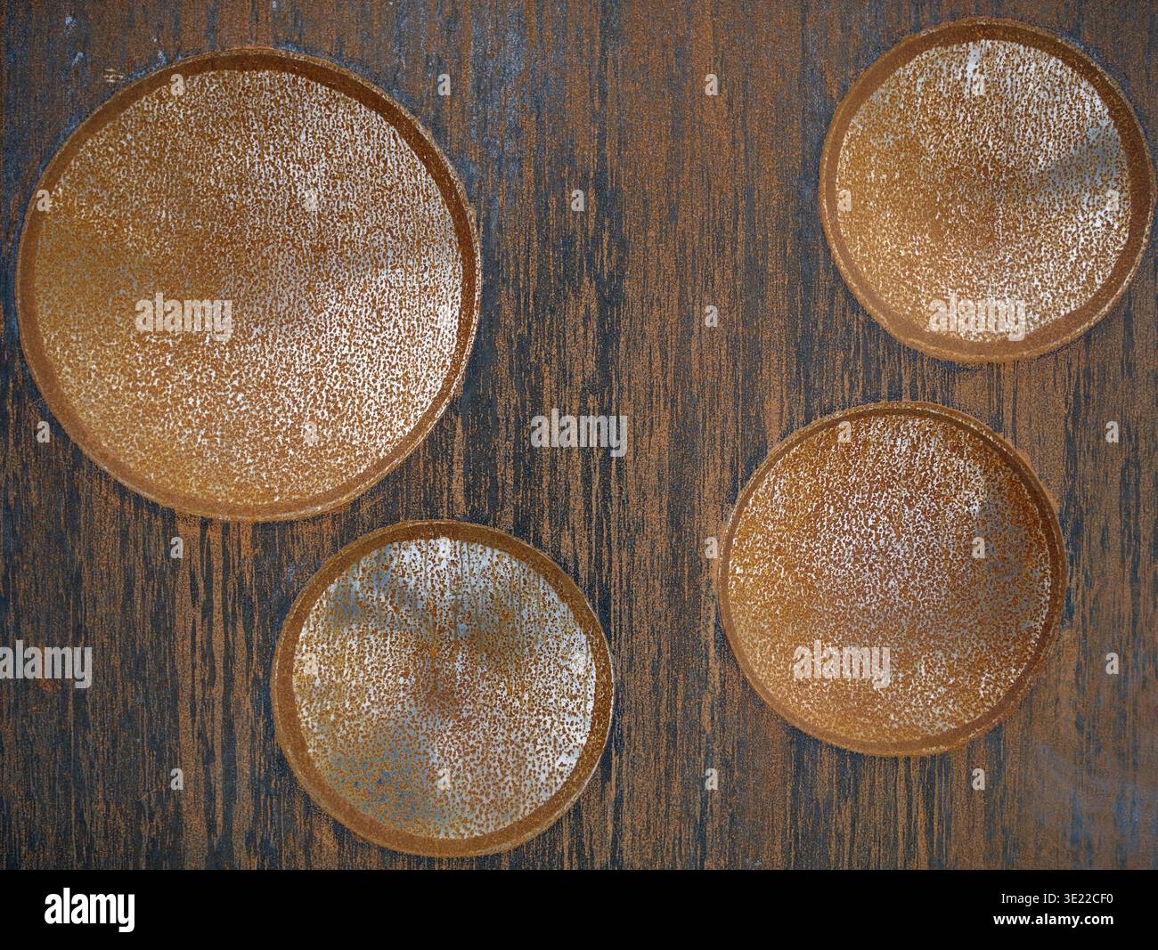 rusty metal plate with circular texture pattern Stock Photo