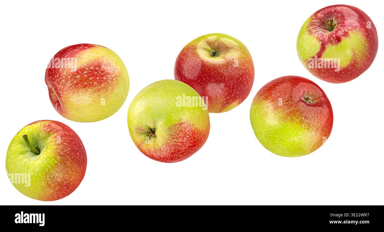Falling red and green apples isolated on white background Stock Photo