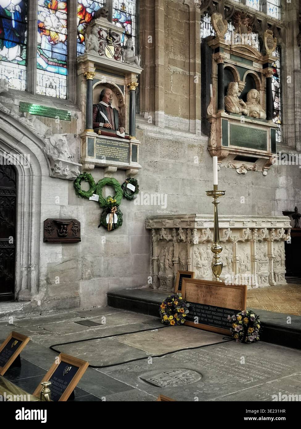 Interior of Holy Trinity Church, Stratford-upon-Avon, showing Shakespeare’s funerary monument and the grave of William Shakespeare and Anne Hathaway - Smartphone Captured Stock Image