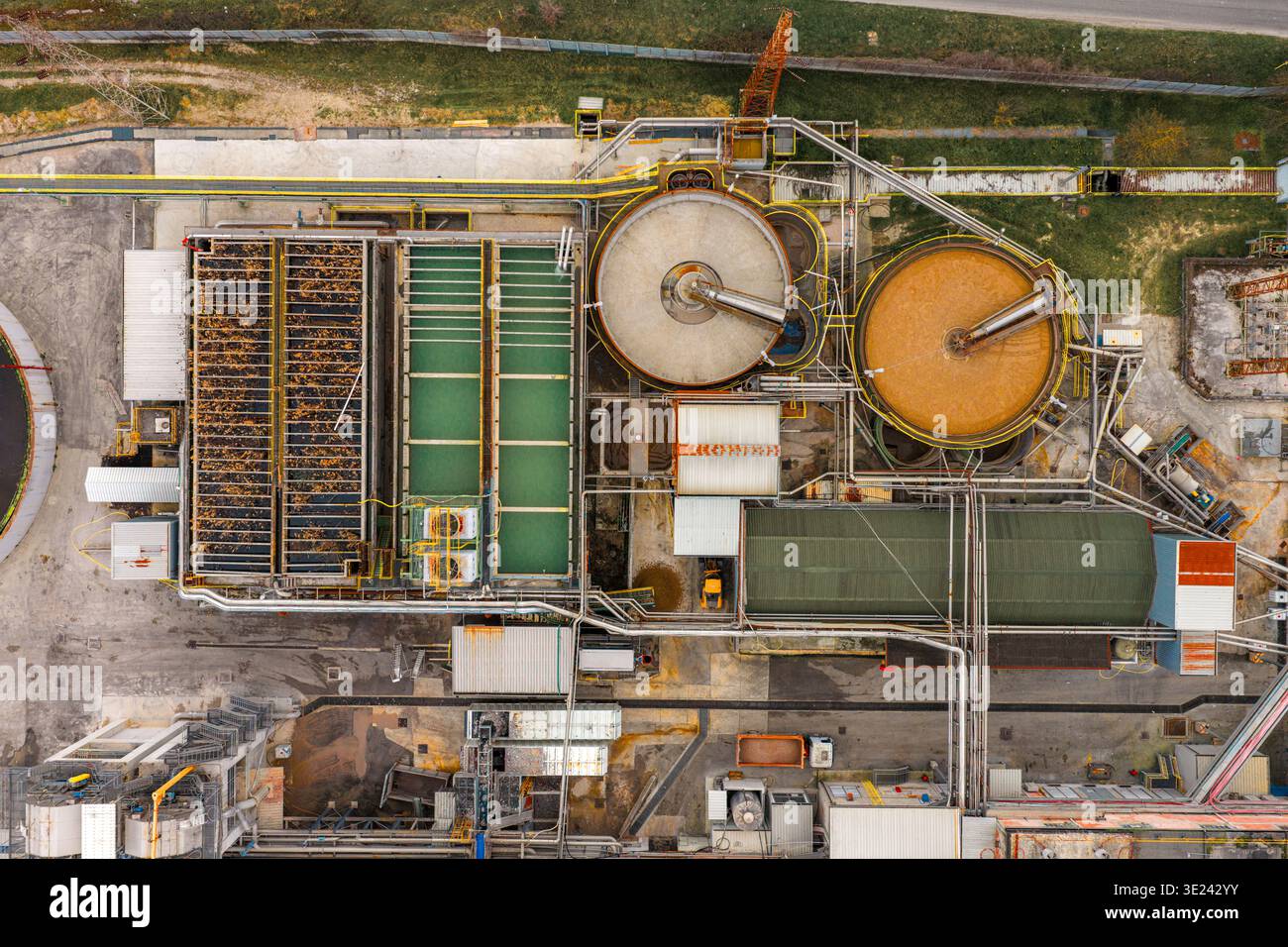 Rectangular Calrifiers Aerial view of the intricate wastewater treatment plant's circular ...