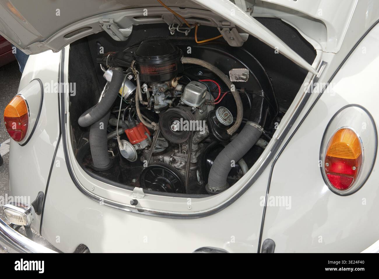 VW Beetle 1200 open bonnet tailgate view of classic air-cooled 1.2-liter four-cylinder boxer engine type 1 engine identification D with 1192 cc engine Stock Photo