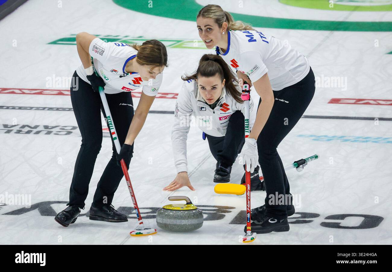 Italy's skip Stefania Constantini, centre, delivers a stone against ...