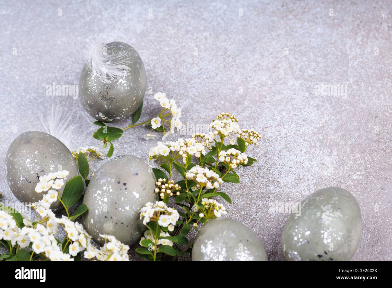 Easter eggs and spring flowers minimal composition Stock Photo