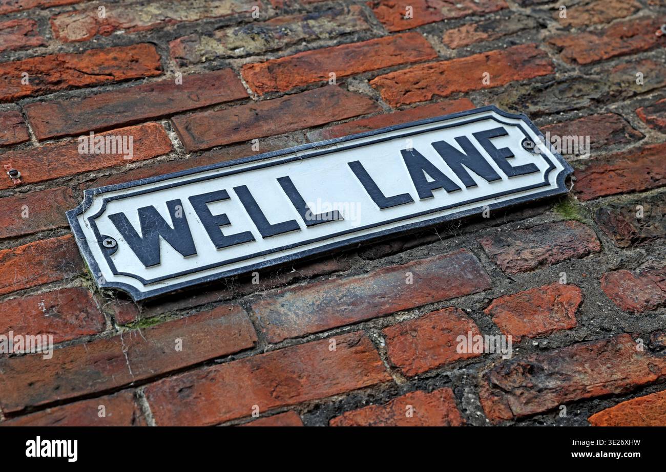 Well Lane street sign in Beverley, East Yorkshire, used as a visual metaphor for community health, wellbeing and living well in later life Stock Photo