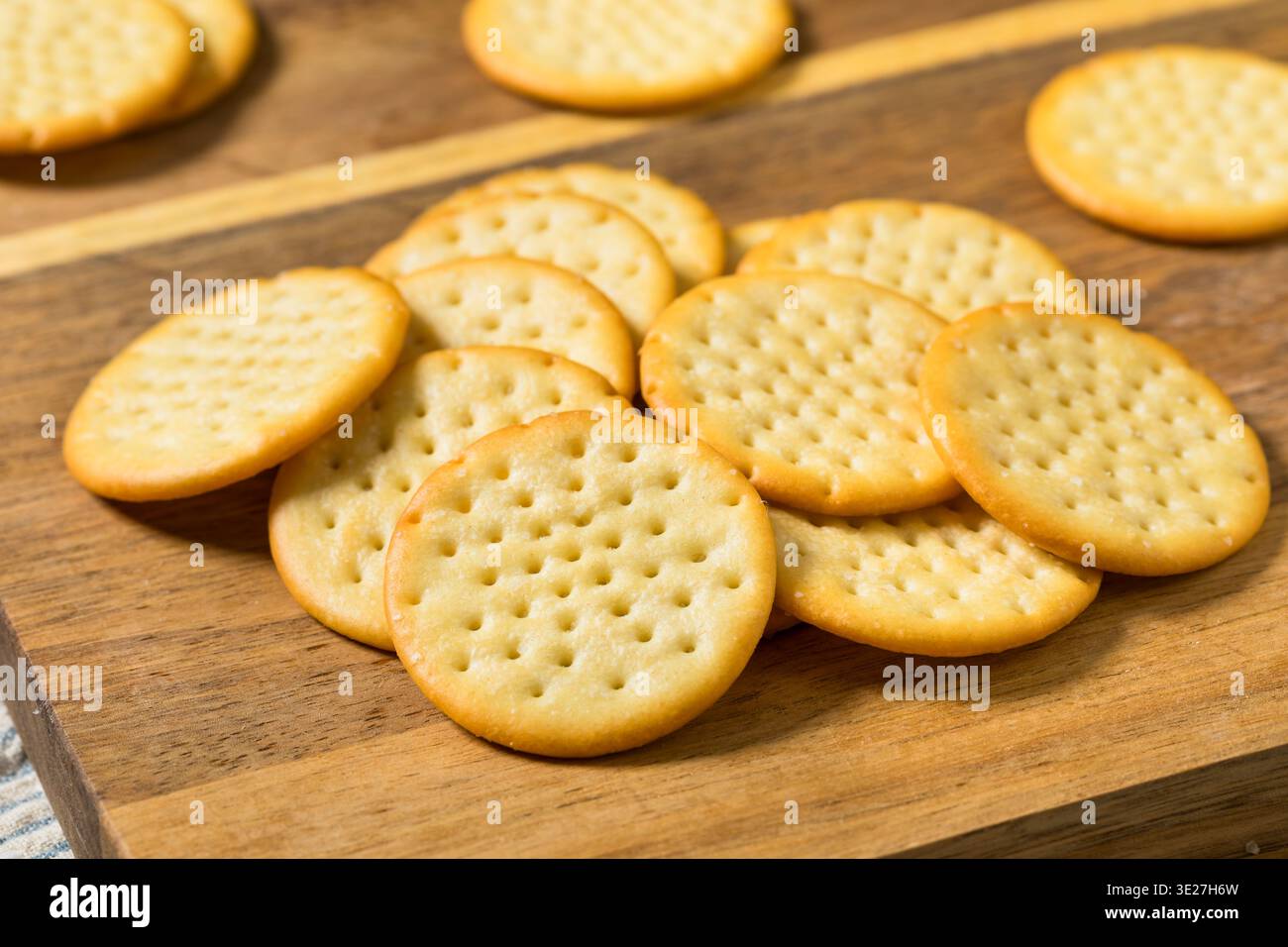 Salty Buttery Round Crackers in a Pile with Sea Salt Stock Photo