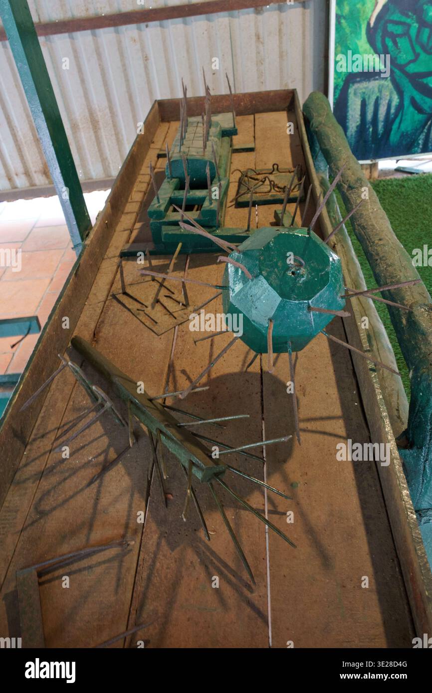 A diorama displays models of booby traps used during the Vietnam War ...