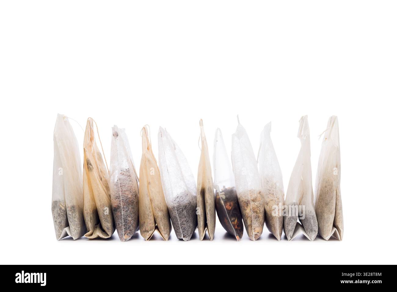 Filter tea bags variety isolated on white background. Stock Photo