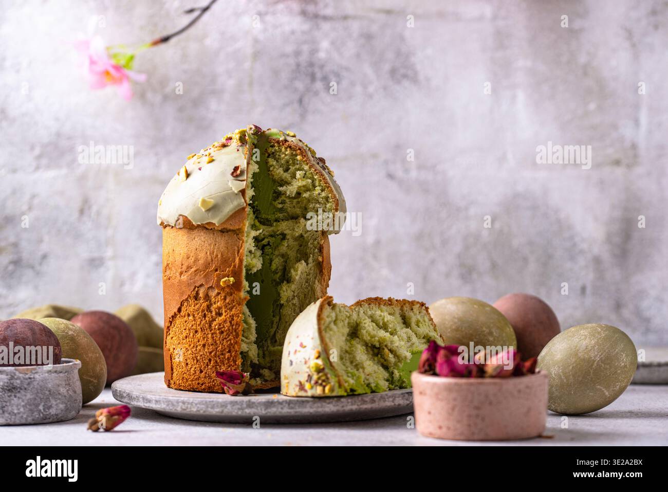 Traditional Easter cake kulich with pistachio Stock Photo