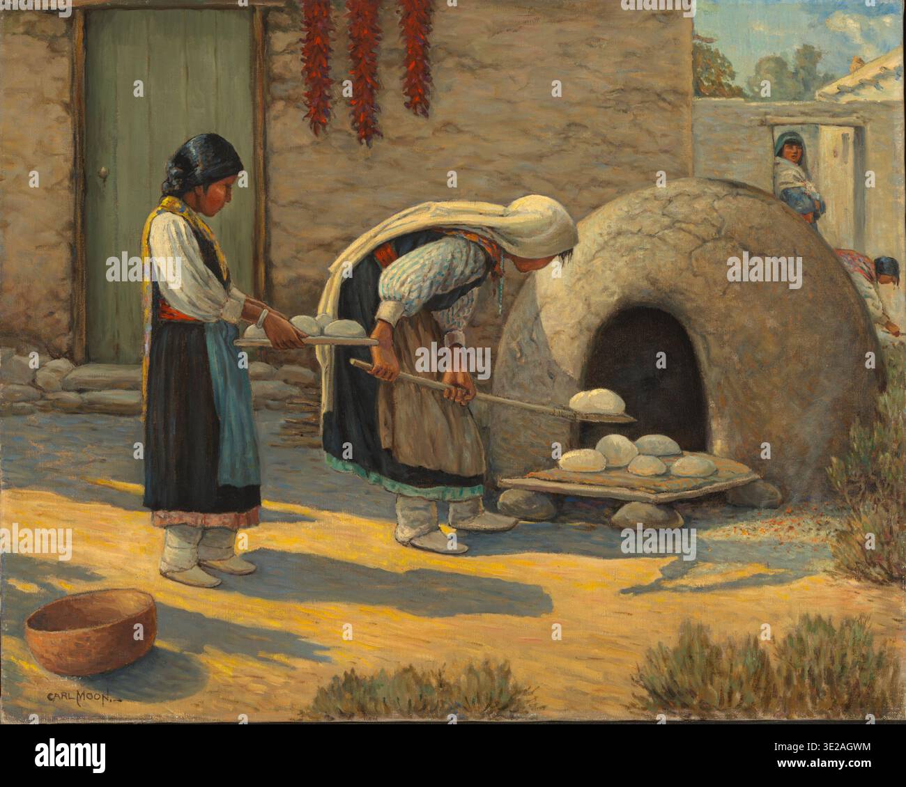 Women baking bread by Carl Moon, depicting two Native American women preparing and baking bread in an outdoor adobe oven, with traditional dress, pottery, and a village setting reflecting daily life and cultural practices. Stock Photo