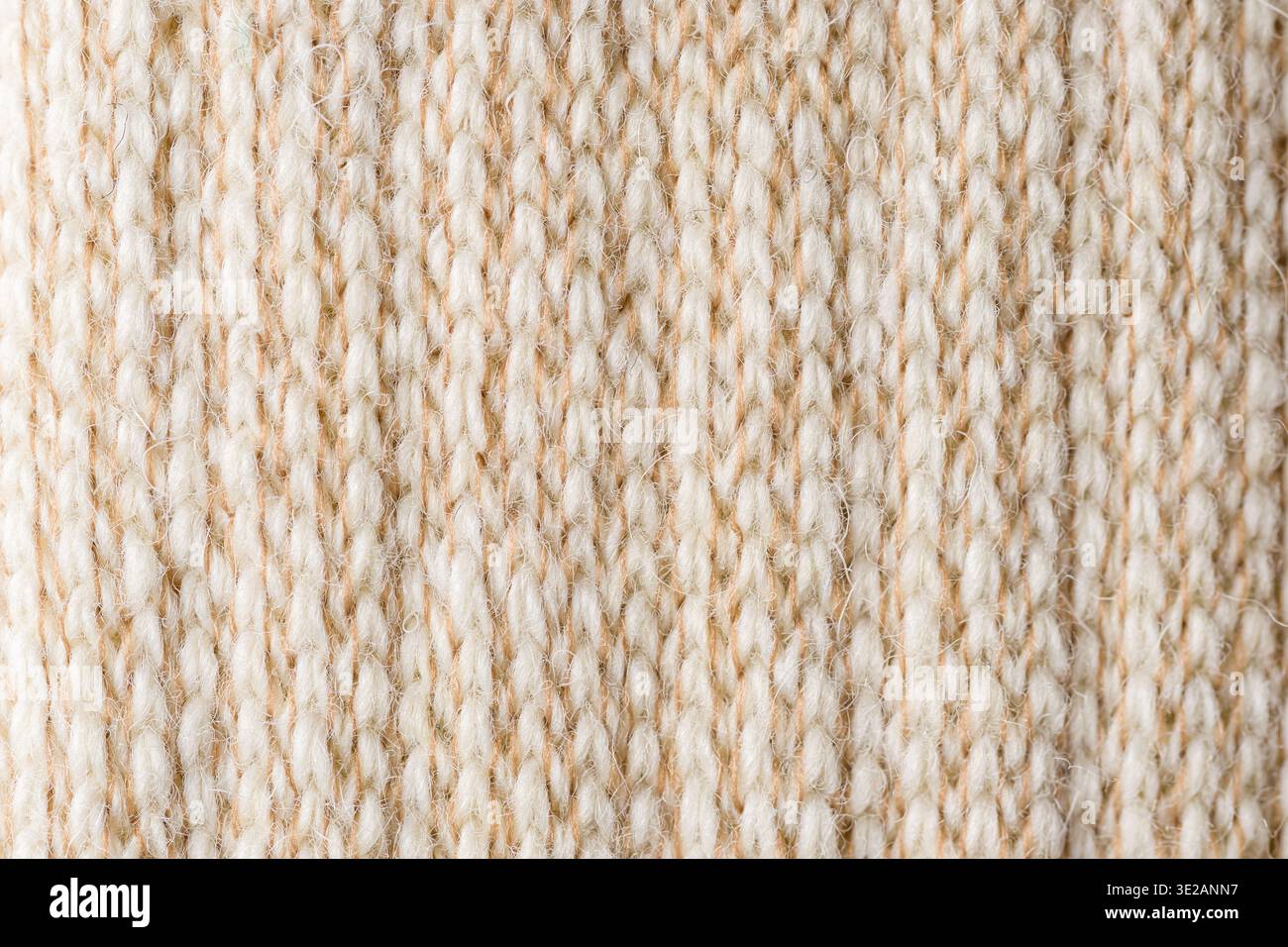 Light alpaca wool knitted textile macro natural fabric texture background Stock Photo