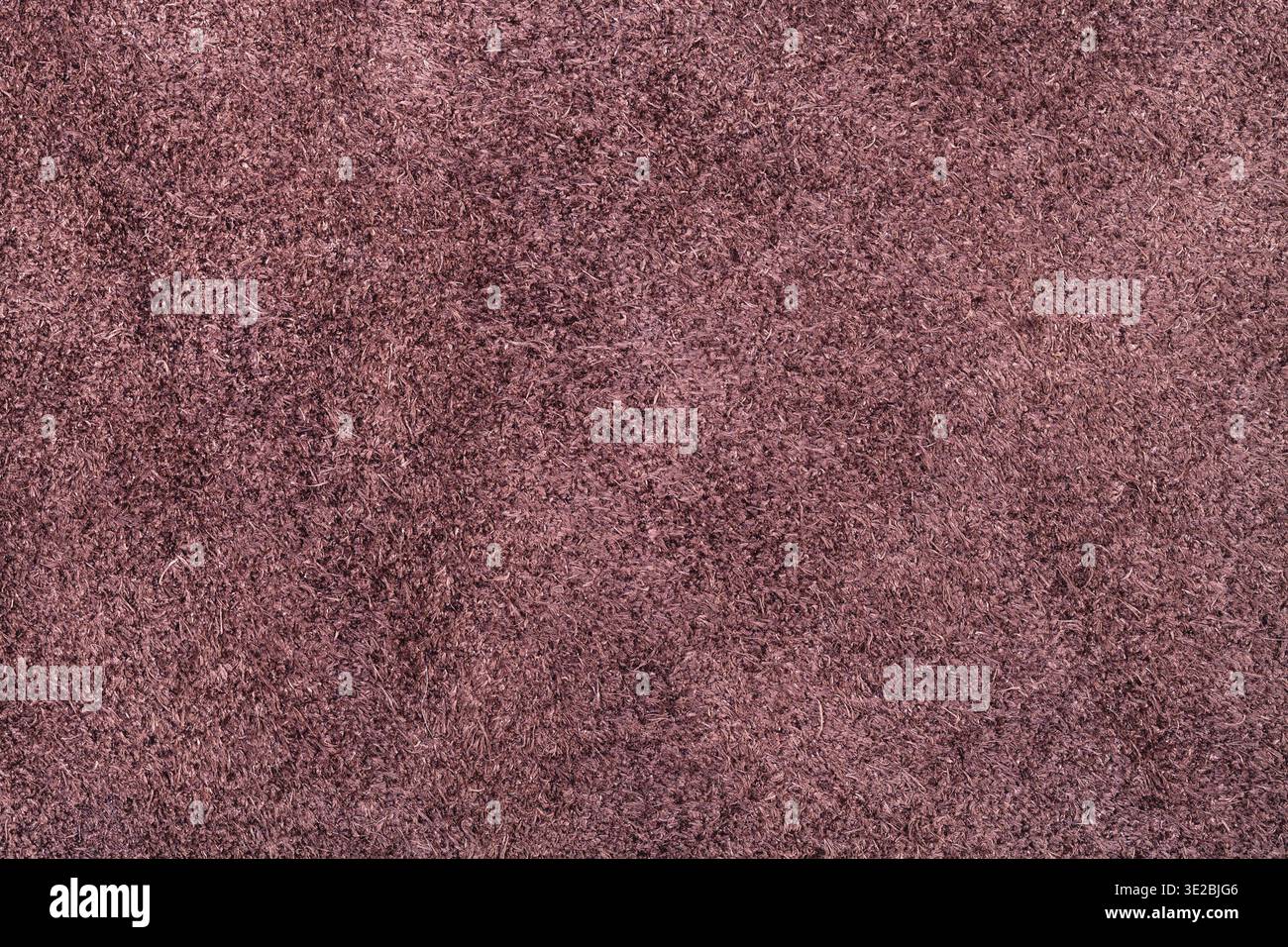 Textured background from maroon brown suede close up Stock Photo