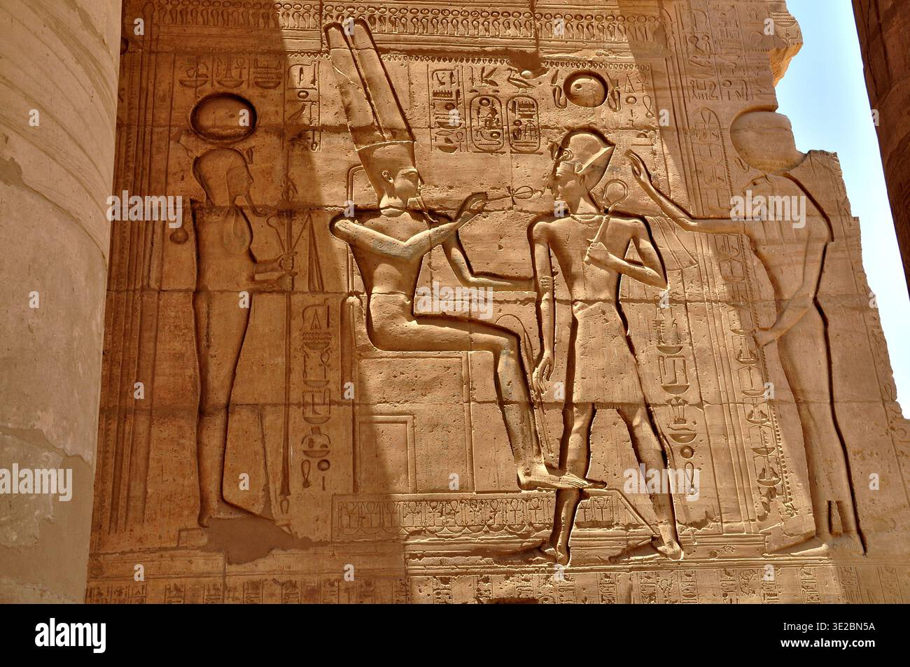 Ancient Egyptian temple wall relief with hieroglyphics and carved ...
