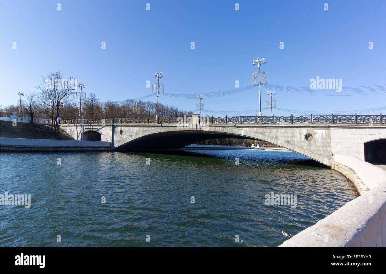 Minsk, Belarus - March 15 , 2026 .An urban landscape with a bridge over the Svisloch River Stock Photo