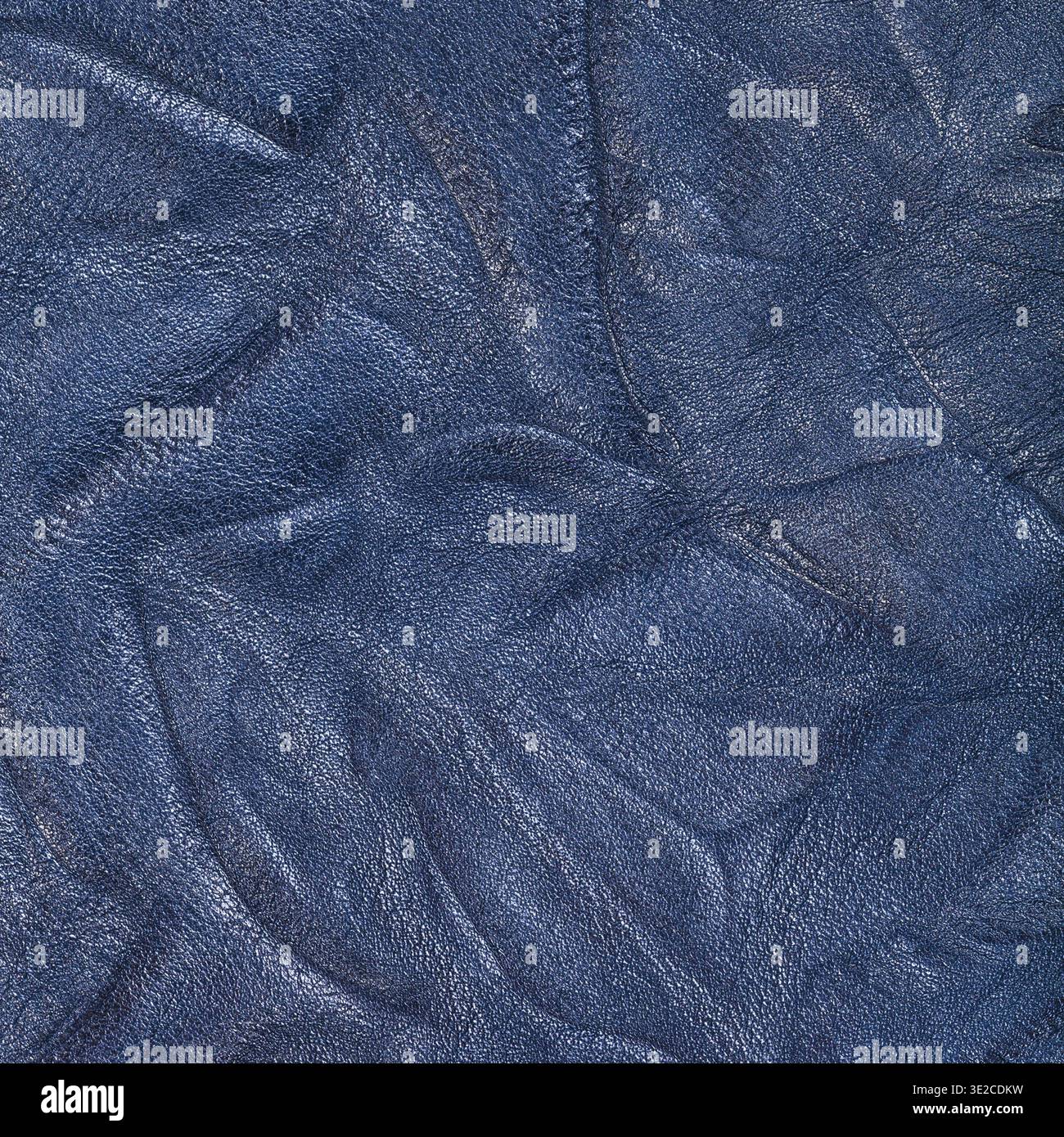 Textured square background from blue crumpled leather close up Stock Photo