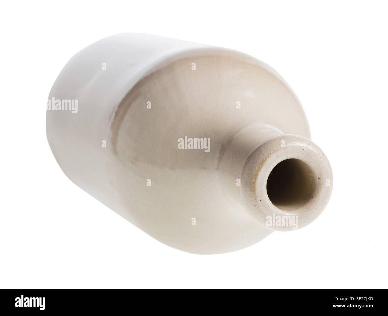 Overturned white ceramic bottle isolated on white background Stock Photo