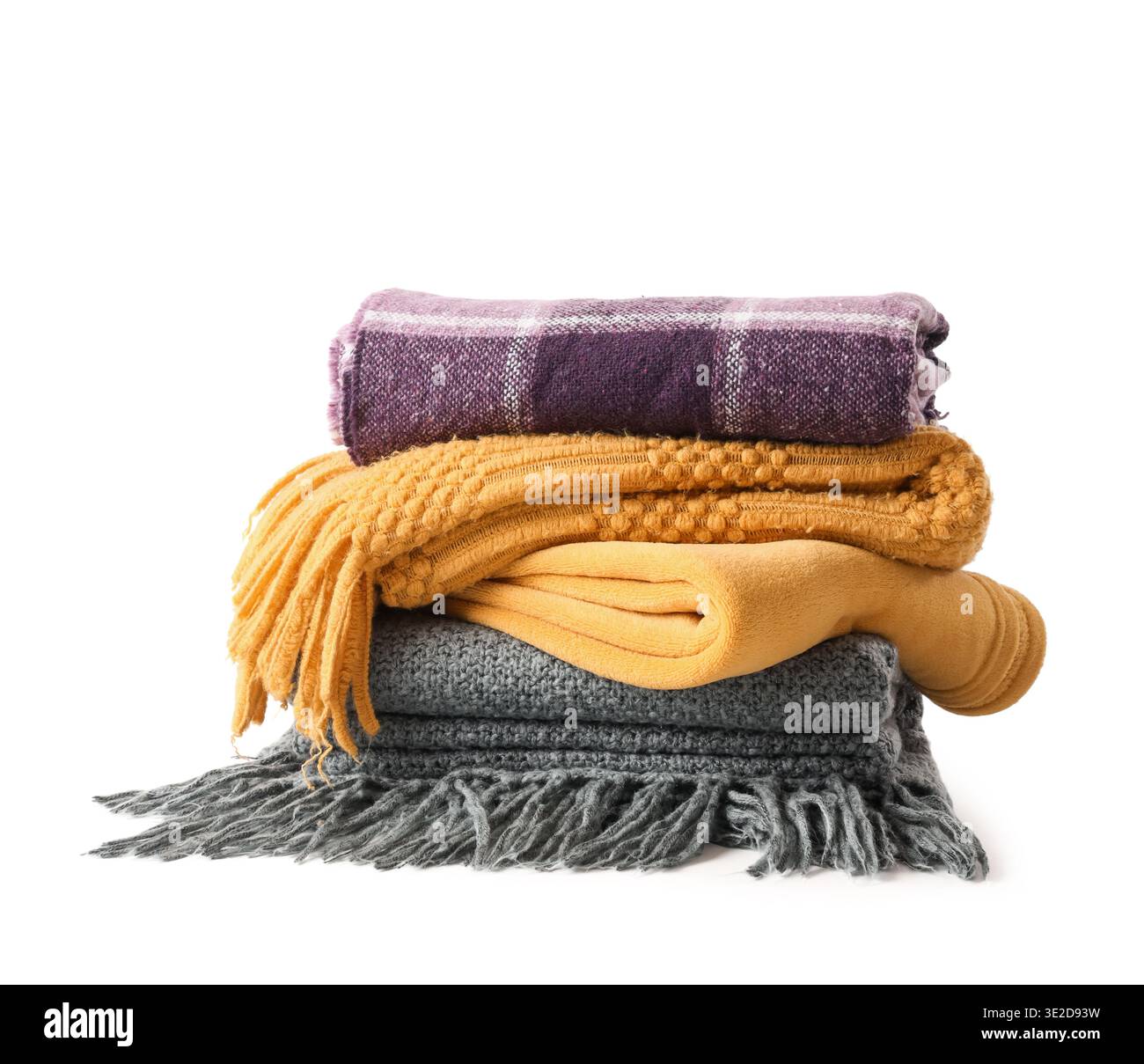 Stack of cozy blankets on white background Stock Photo