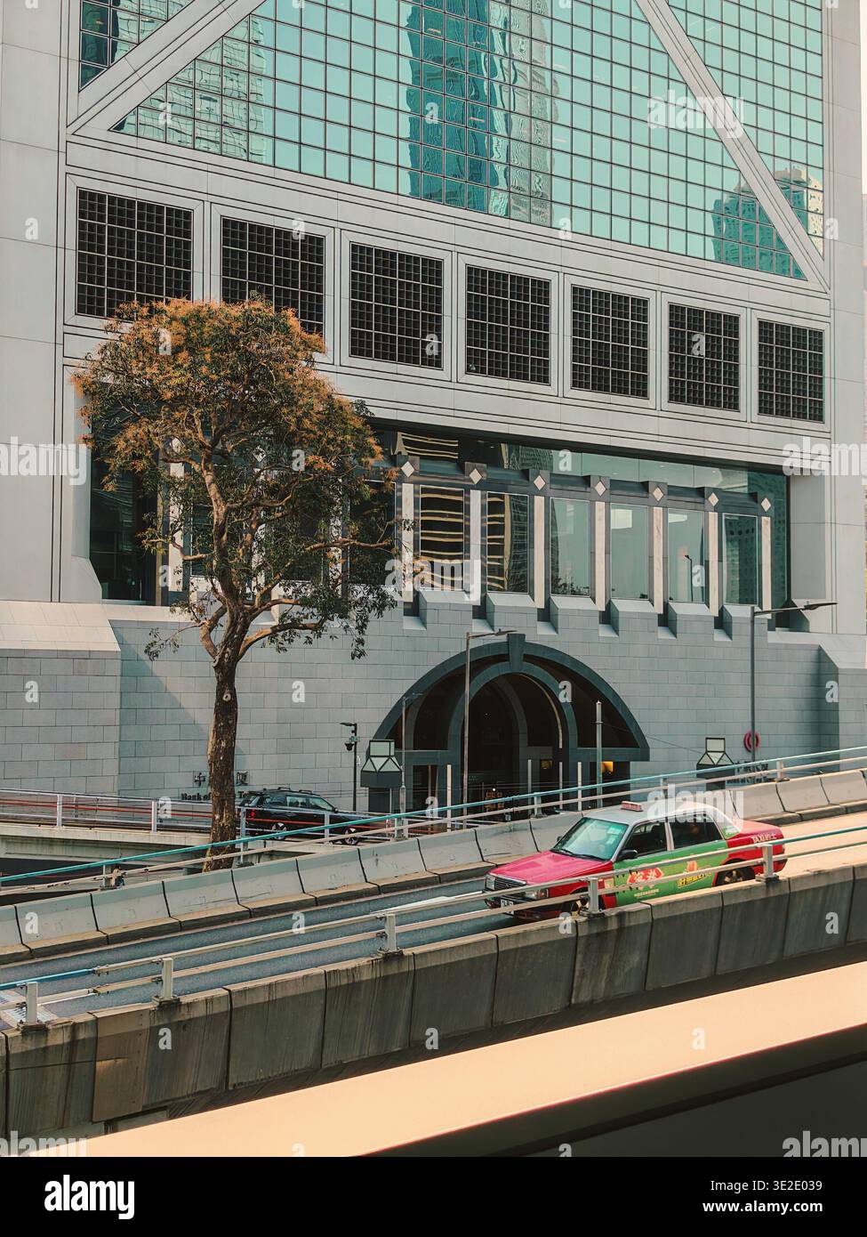 Mar 18 2026 - Hong Kong: A striking glass and metal building with ...