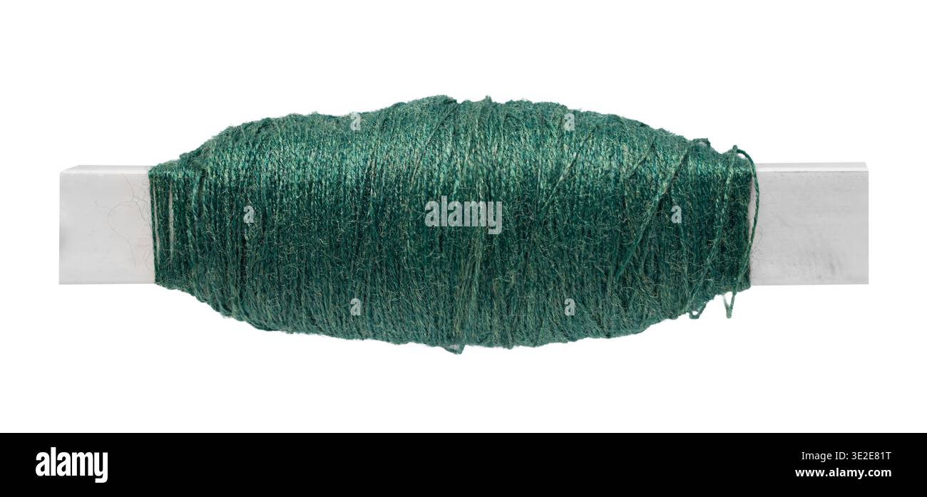 spool of colored thread on a white isolated background Stock Photo