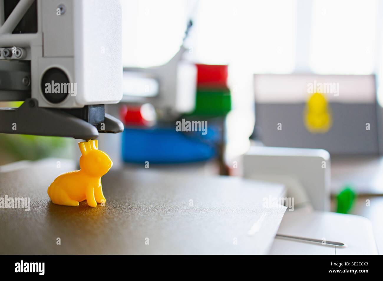 3D Printer Creating Yellow Bunny Stock Photo