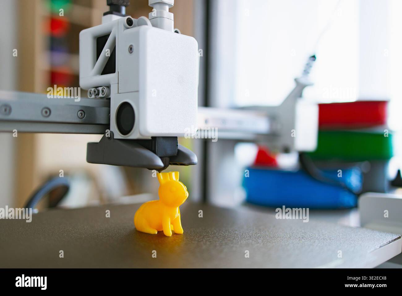 3D Printer Creating Yellow Bunny Stock Photo