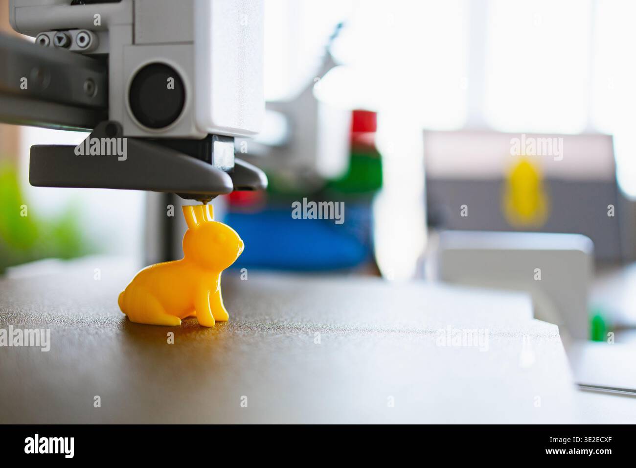 3D Printer Creating Yellow Bunny Stock Photo
