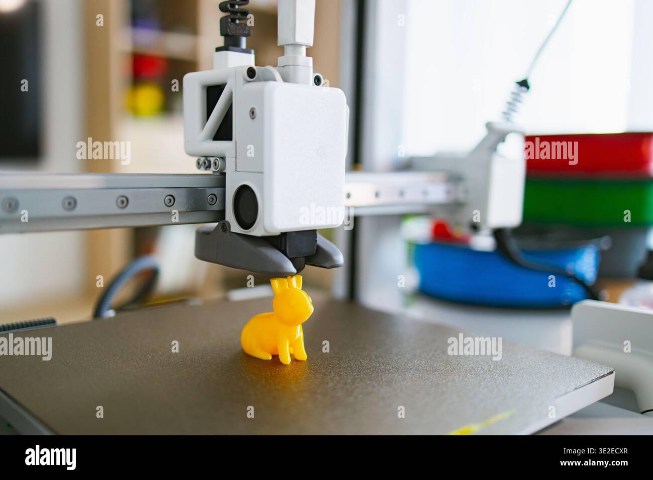 3D Printer Creating Toy Bunny Stock Photo