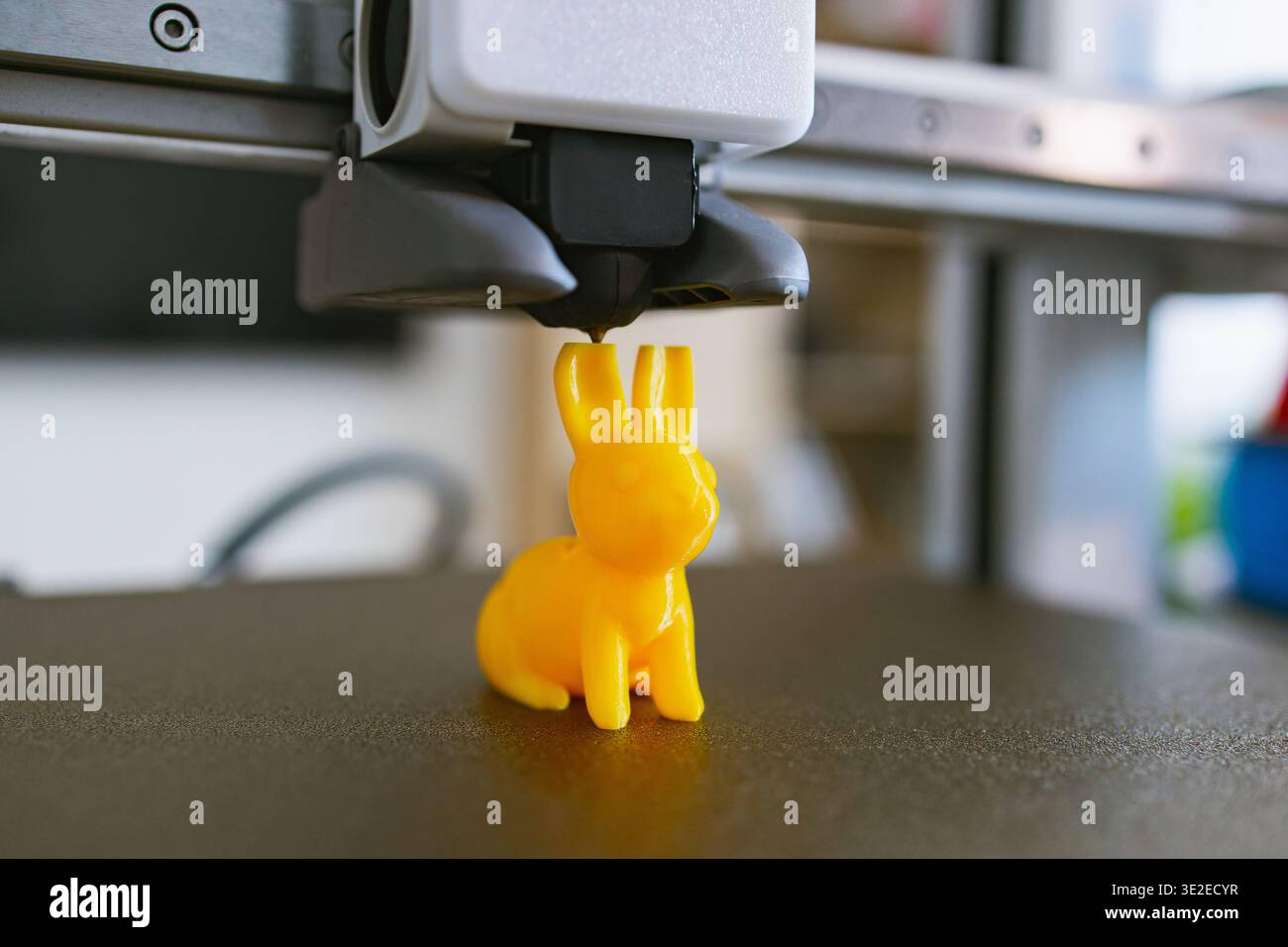 3D Printer Creating Yellow Bunny Stock Photo