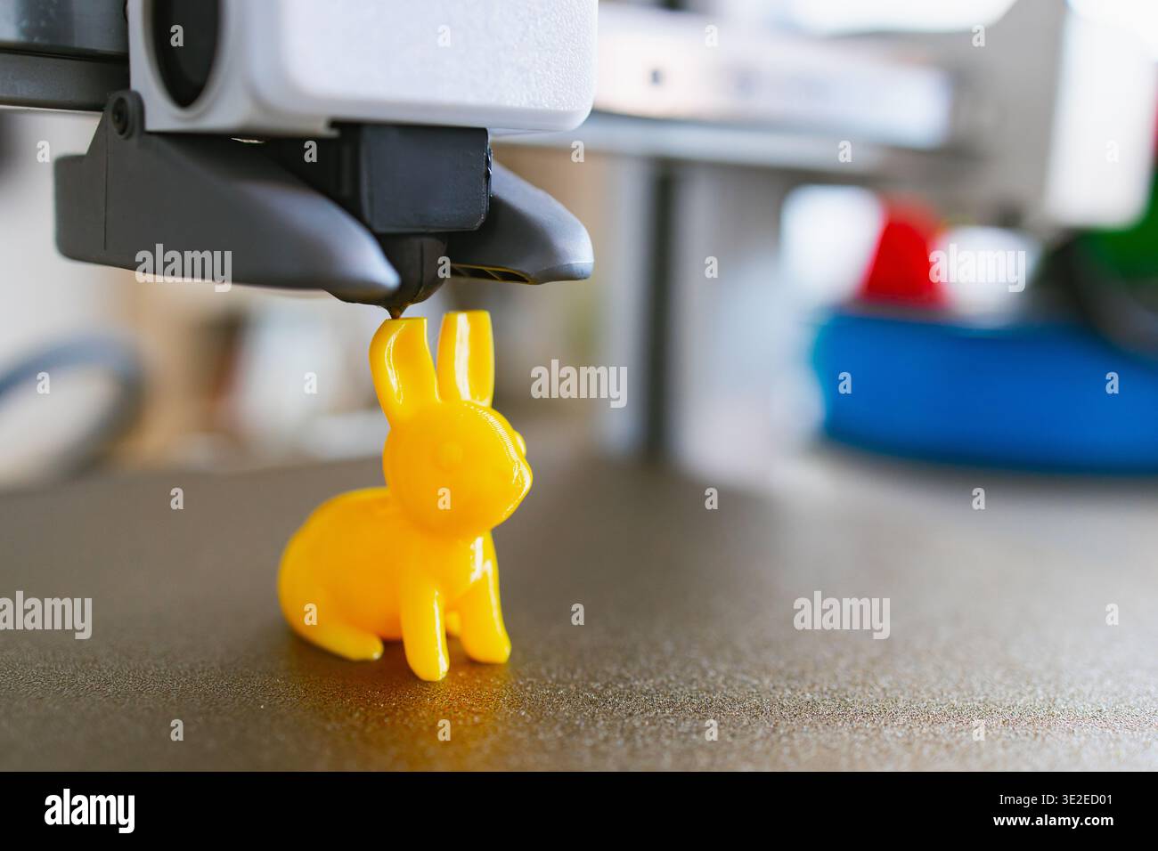 3D Printer Creating Yellow Bunny Stock Photo