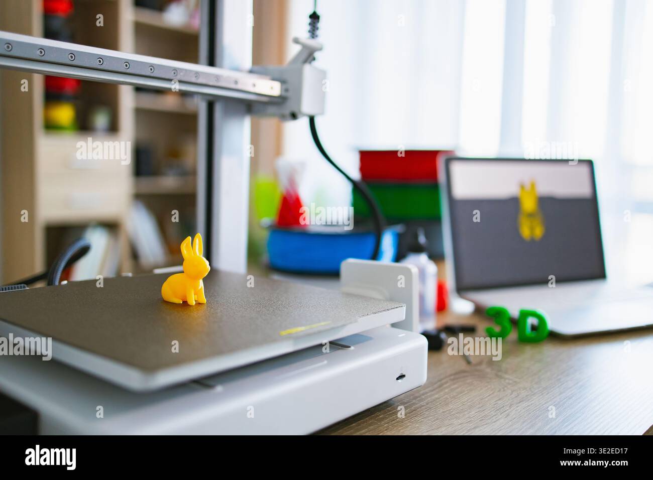 3D Printer Creating Yellow Bunny Stock Photo