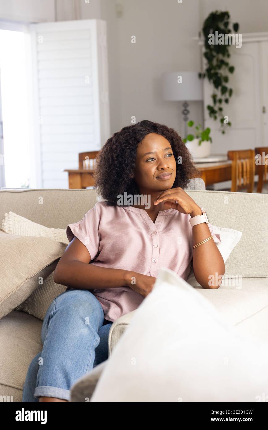 Female wearing beige top hi-res stock photography and images - Alamy