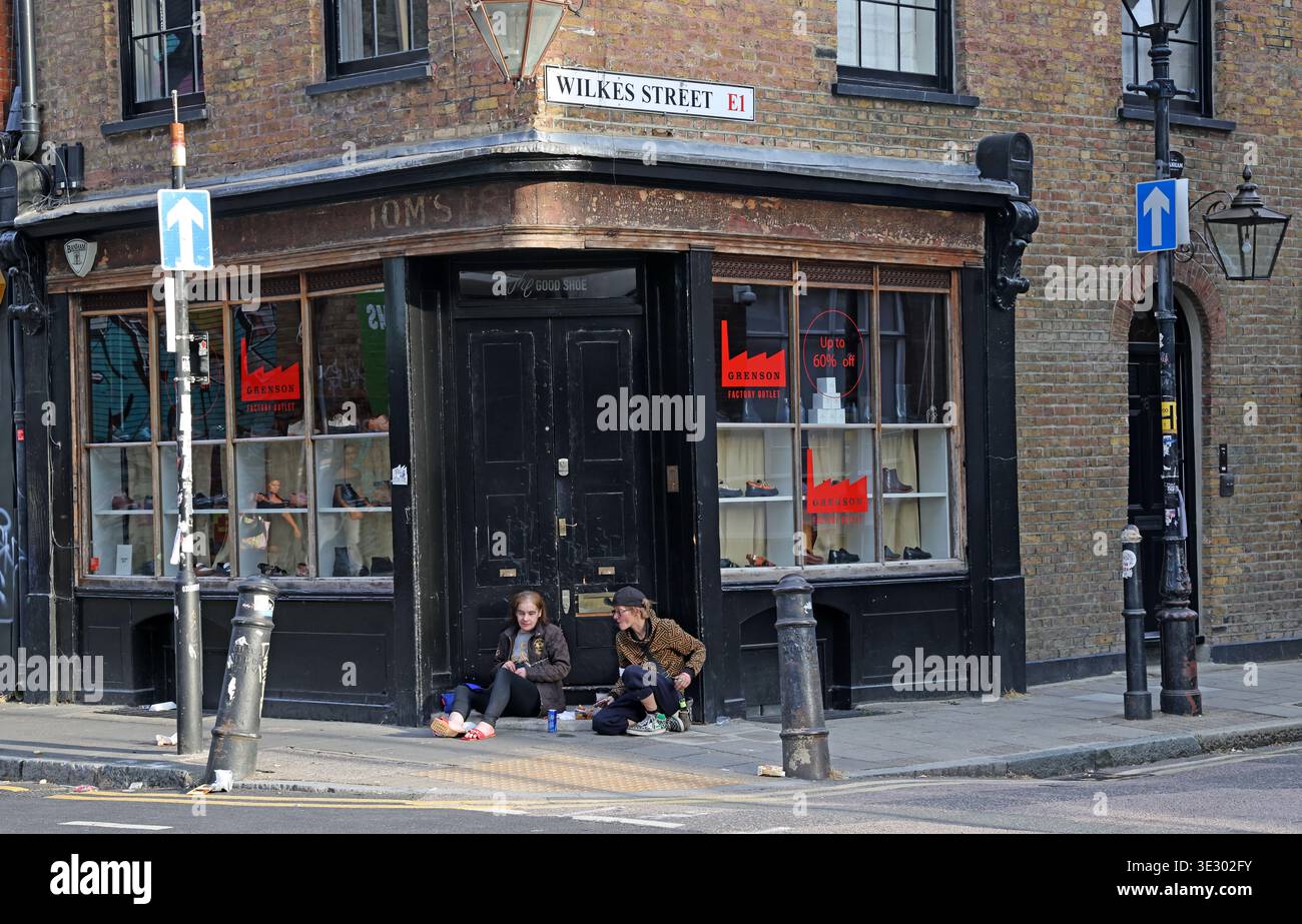Historic dark-painted shopfront at the corner of Wilkes Street and Hanbury Street in Spitalfields, east London. Stock Photo