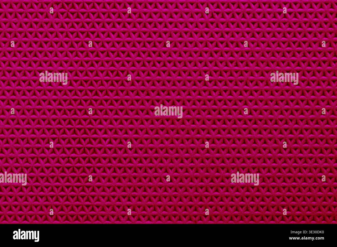Abstract red surface with repeating triangular pattern, creating a modern, textured geometric background ideal for design projects. Stock Photo