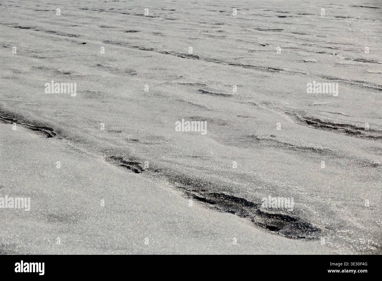 Textured Frozen snow Surface with Linear Grooves Stock Photo