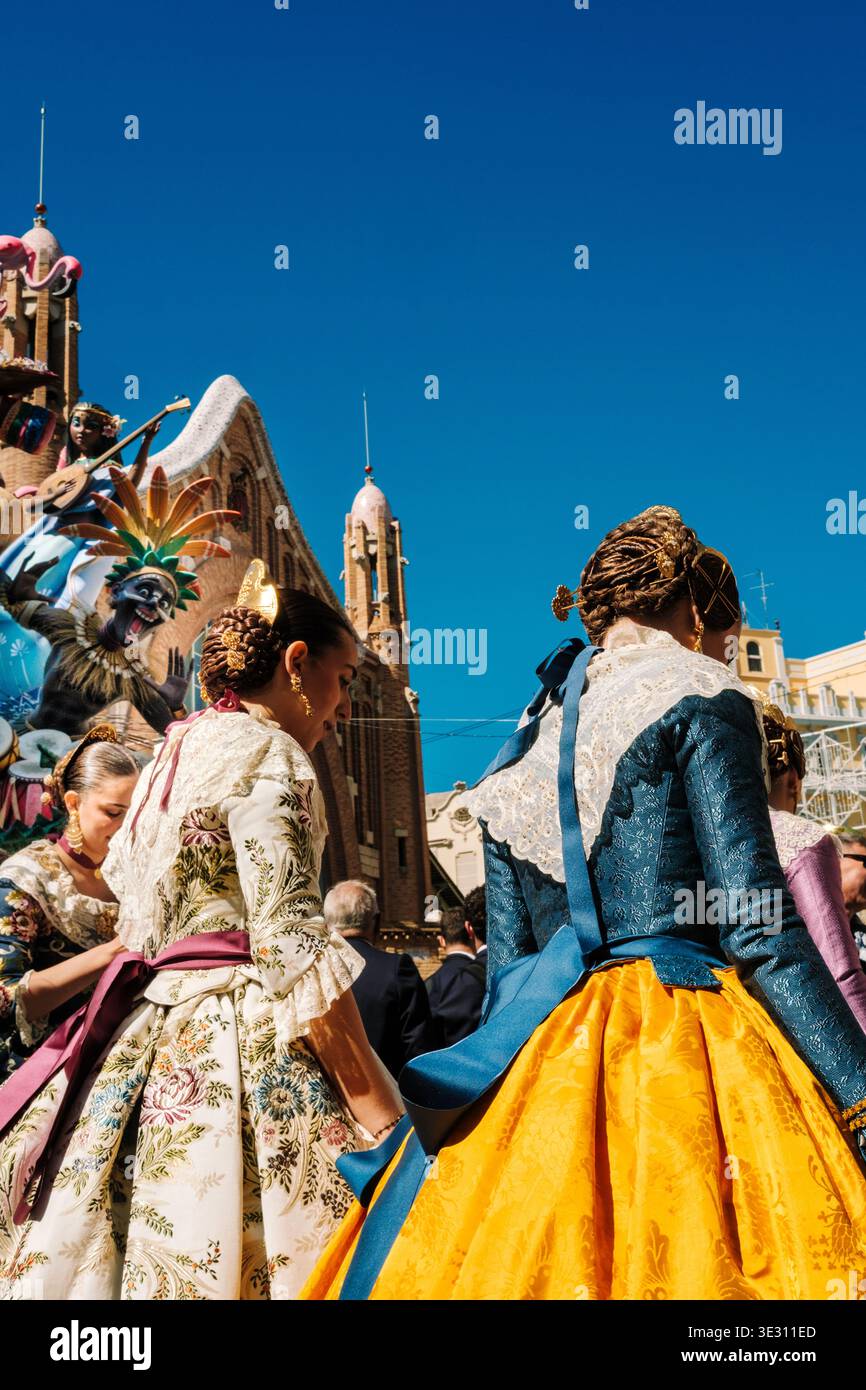 fallas dress Women and girls wear fallera dresses for the Fallas de Valencia festival in Valencia, Spain. Inspired by clothes worn centuries ago by women working in rice fields around the city, the dresses