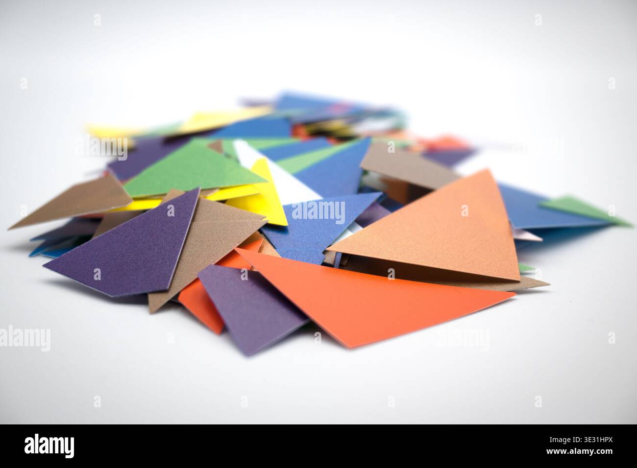 Colored pieces of paper, background. Stock Photo